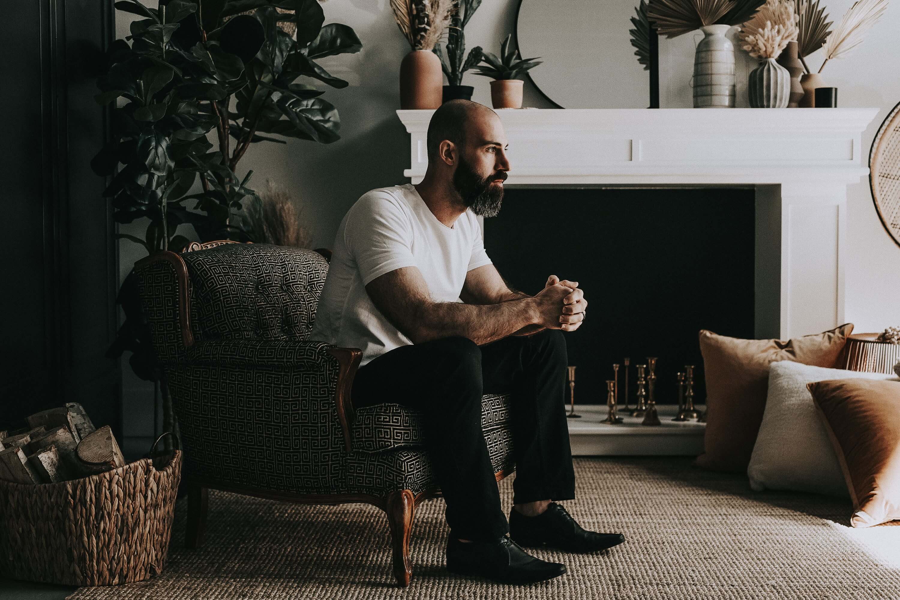 Landon Poburan sitting at home in Victoria, BC